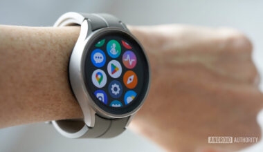 A Samsung Galaxy Watch 5 Pro on a user's wrist displays the app screen.