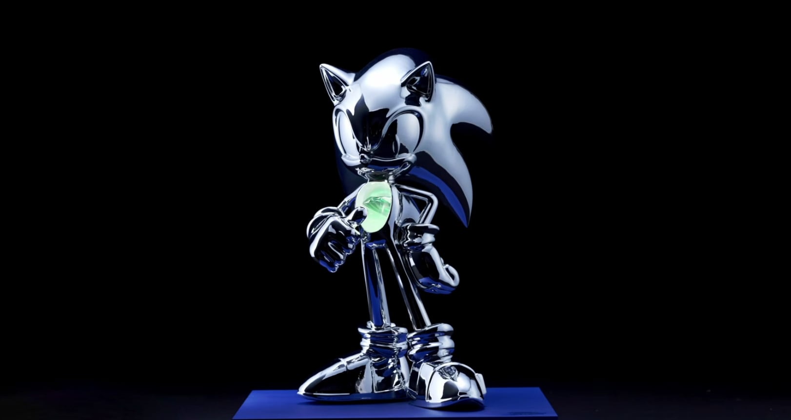 A silver statue of Sonic the Hedgehog containing Sonic's "DNA" encased in a Chaos Emerald