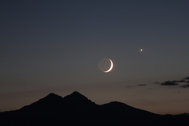 moon over longs peak.jpg The moon and venus over Long's Peak taken July 26th with a hydrogen alpha telescope by Brian Kimball, a member of the Longmont Astronomical Society that will provide telescopes and guide stargazers during the Summer Star Party in Superior Aug. 22. Courtesy photo.