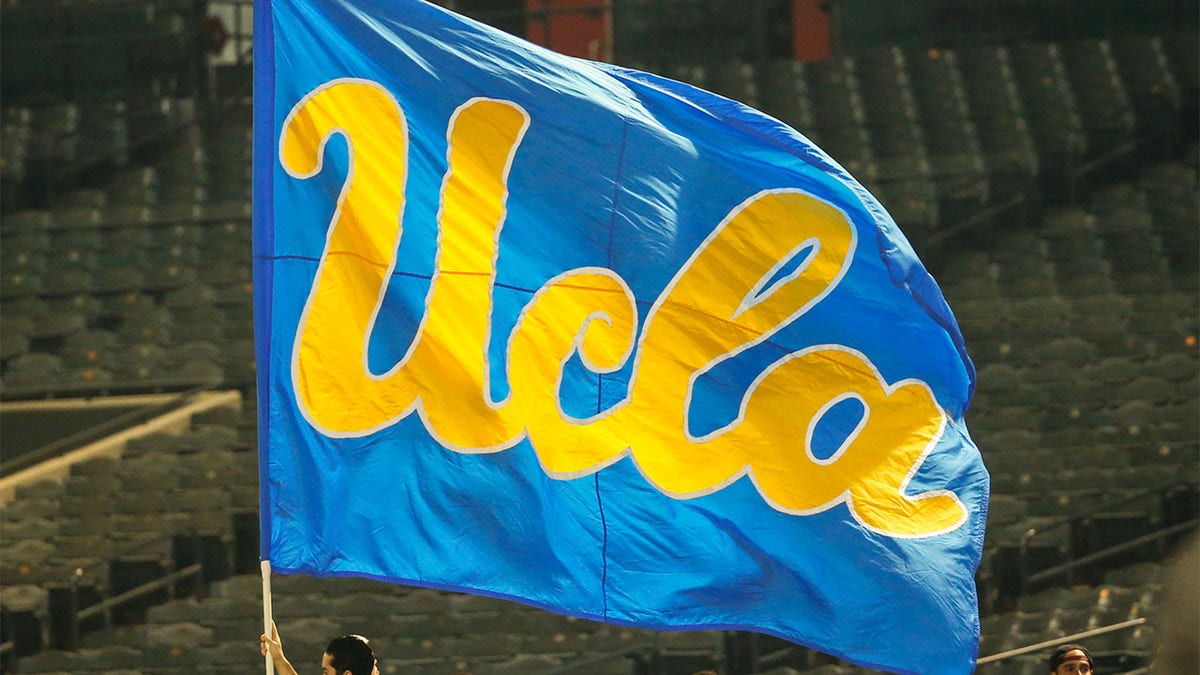 The UCLA flag waving during the Cactus Bowl college football game at Chase Field in Phoenix, Arizona