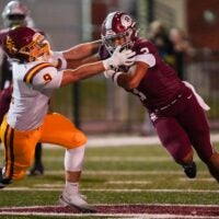 Science Hill's Hayden Smith (9) tackles Oak Ridge's Malik Howard (3) during a TSSAA football play-off game between Oak Ridge and Science Hill in Oak Ridge, Tenn., on Nov. 6, 2025.