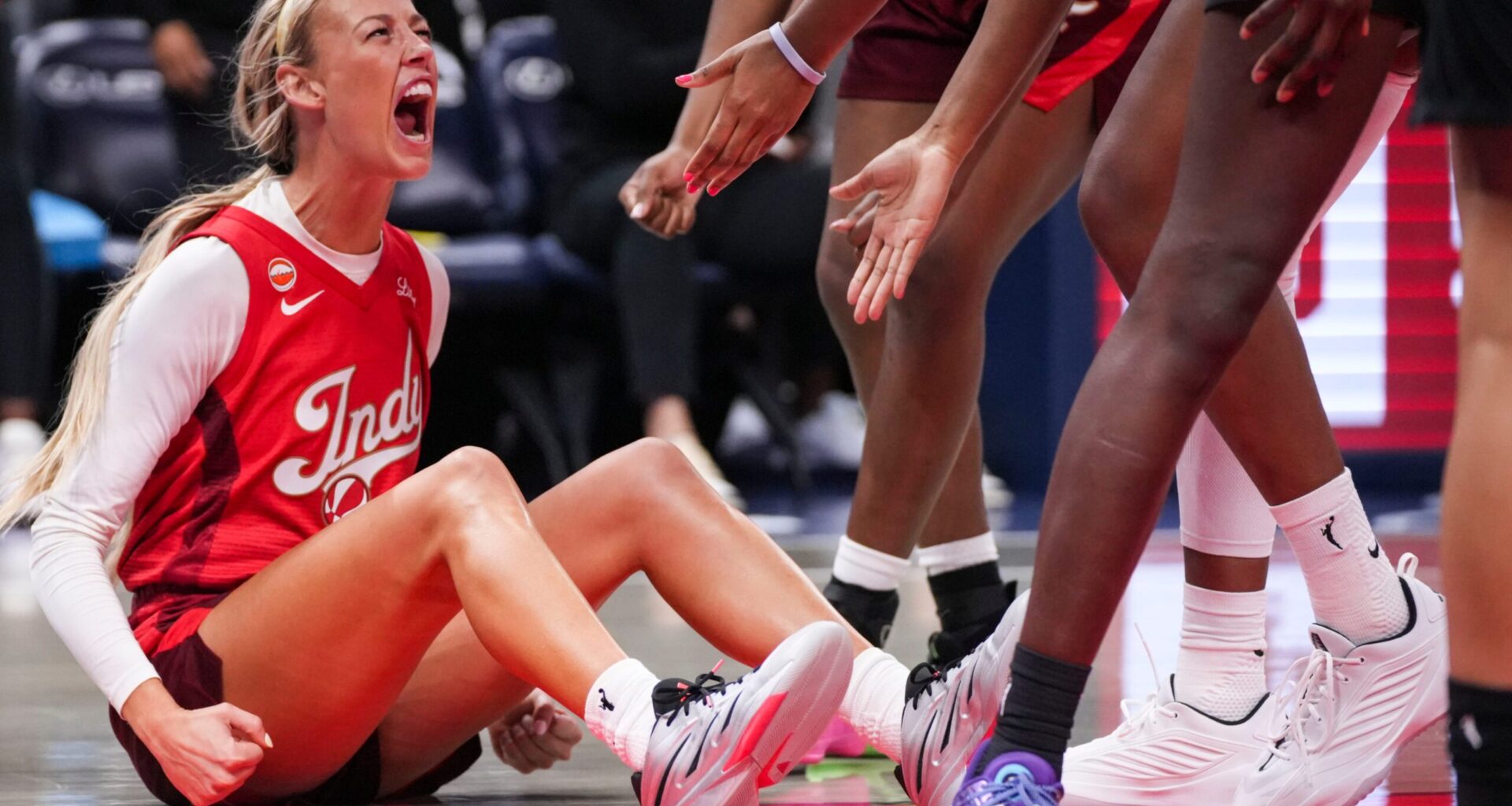 Indiana Fever guard Sophie Cunningham (8) celebrates Friday, May 22, 2026, during a game at Gainbridge Fieldhouse in Indianapolis. The Indiana Fever defeated the Golden State Valkyries, 90-82.