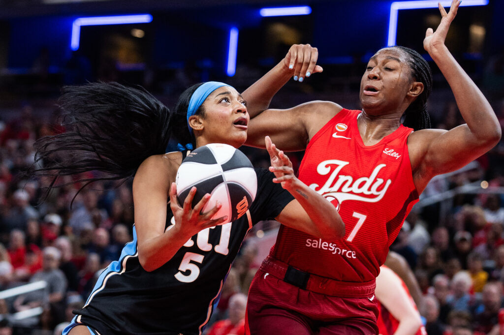 Jun 4, 2026; Indianapolis, Indiana, USA; Atlanta Dream forward Angel Reese (5) drives to the basket against Indiana Fever center-forward Aliyah Boston (7) in the second half at Gainbridge Fieldhouse. Mandatory Credit: Trevor Ruszkowski-Imagn Images