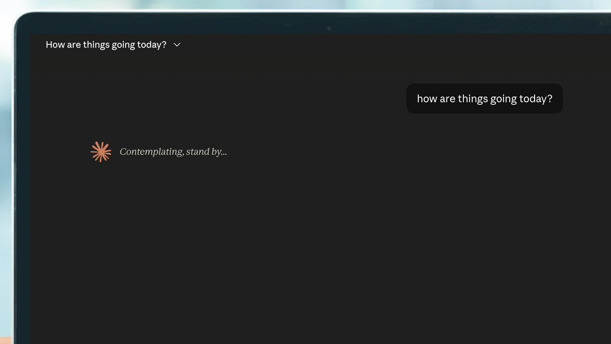A laptop screen showing a Claude outage