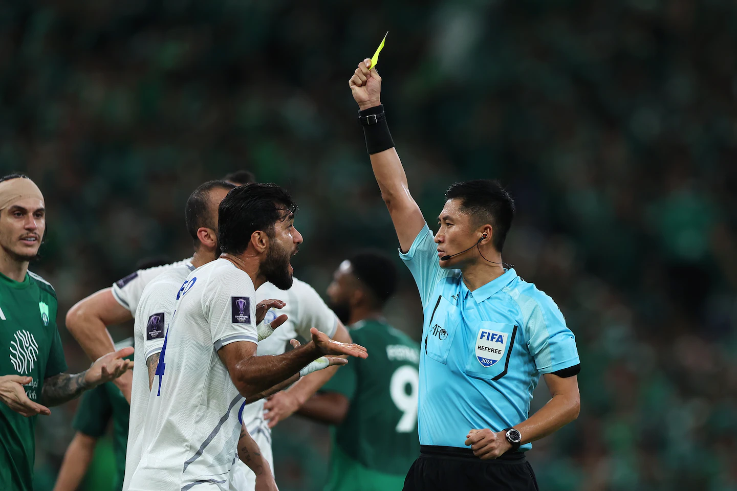 Shut out of the World Cup again, China roots for a referee