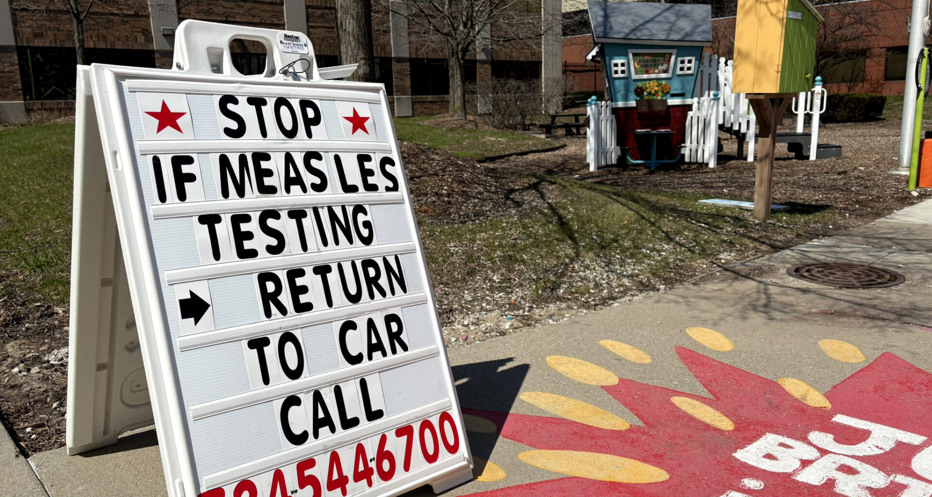 With a measles outbreak in Washtenaw County, Michigan, this spring, local health officials have worked to contain cases with ramped-up contact tracing and testing efforts — including testing people for measles outside the Washtenaw County Health Department offices in Ypsilanti. (Kate Wells/KFF Health News)