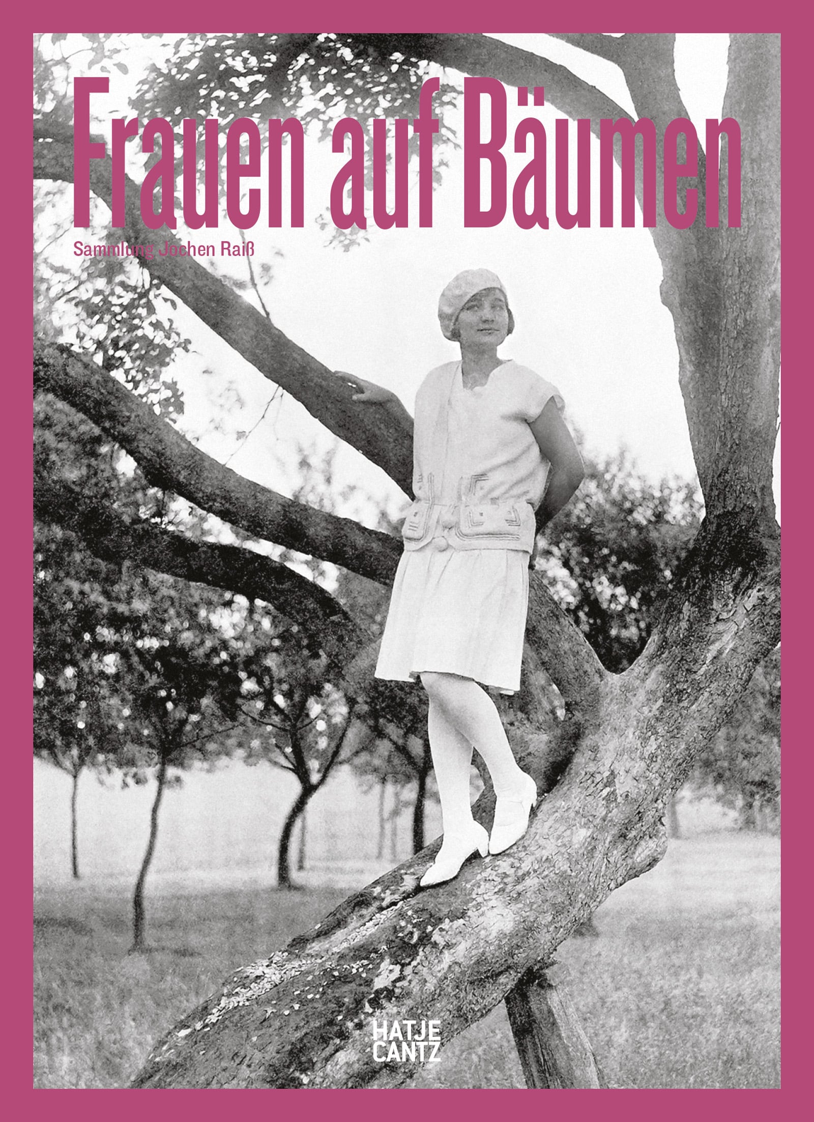 Black and white photo of a woman in a dress and cloche hat standing on a tree branch. Pink border with large text at the top reading "Frauen auf Bäumen" and smaller text below. Outdoor, orchard-like setting.