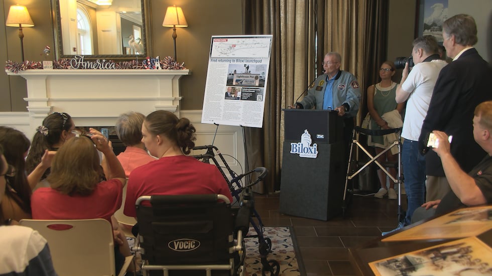 Close to 200 people packed the Biloxi Visitors Center for the event, including many of Haise’s...