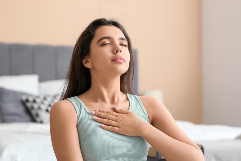 Young Woman Breathing Practice Home