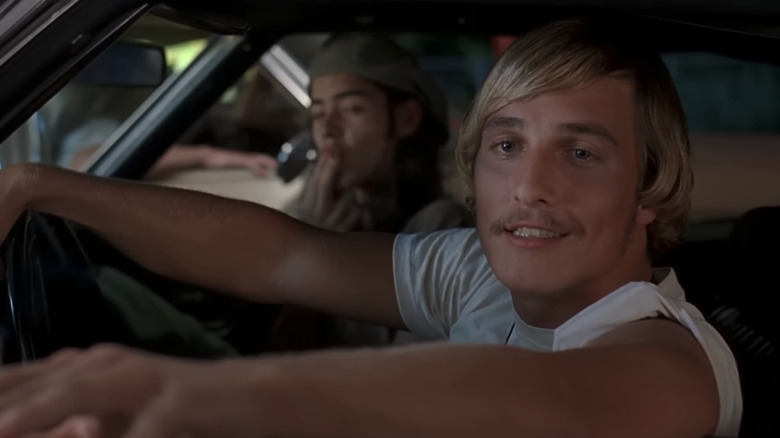 Matthew McConaughey's David Wooderson looks out of a car window in Dazed and Confused