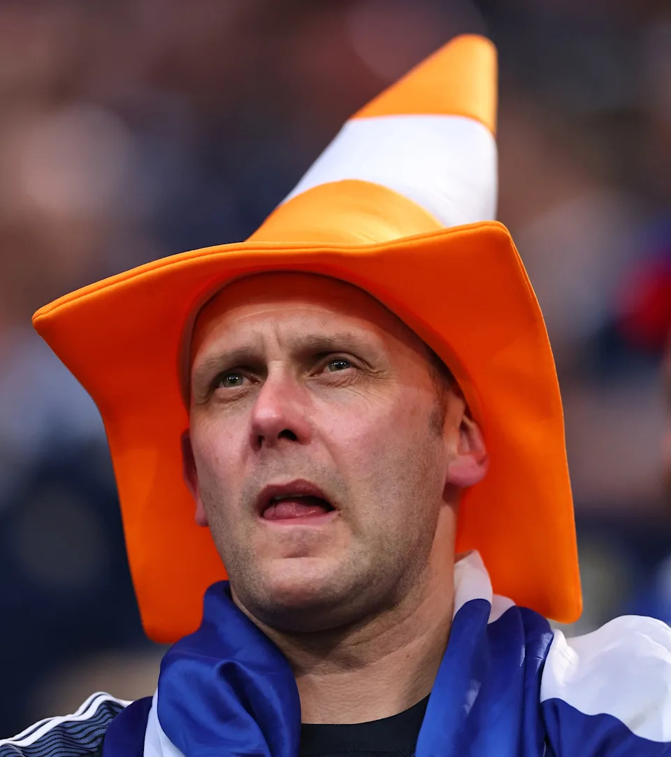 A fan of Scotland wearing a traffic cone hat prior to the UEFA EURO 2024 group stage match between Germany and Scotland.
