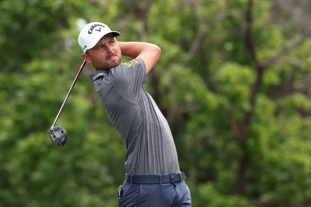 Adam Svensson playing a shot from the sixth tee during the Charles Schwab Challenge.