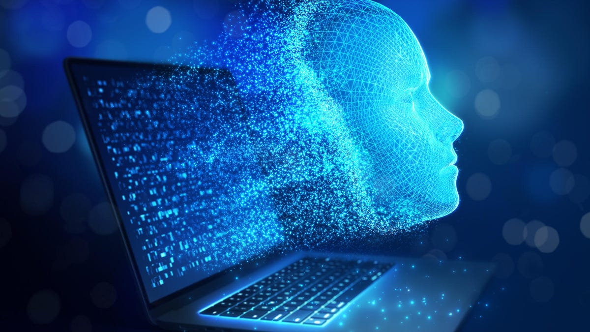A human-looking digitally rendered face emerges out of a laptop computer.