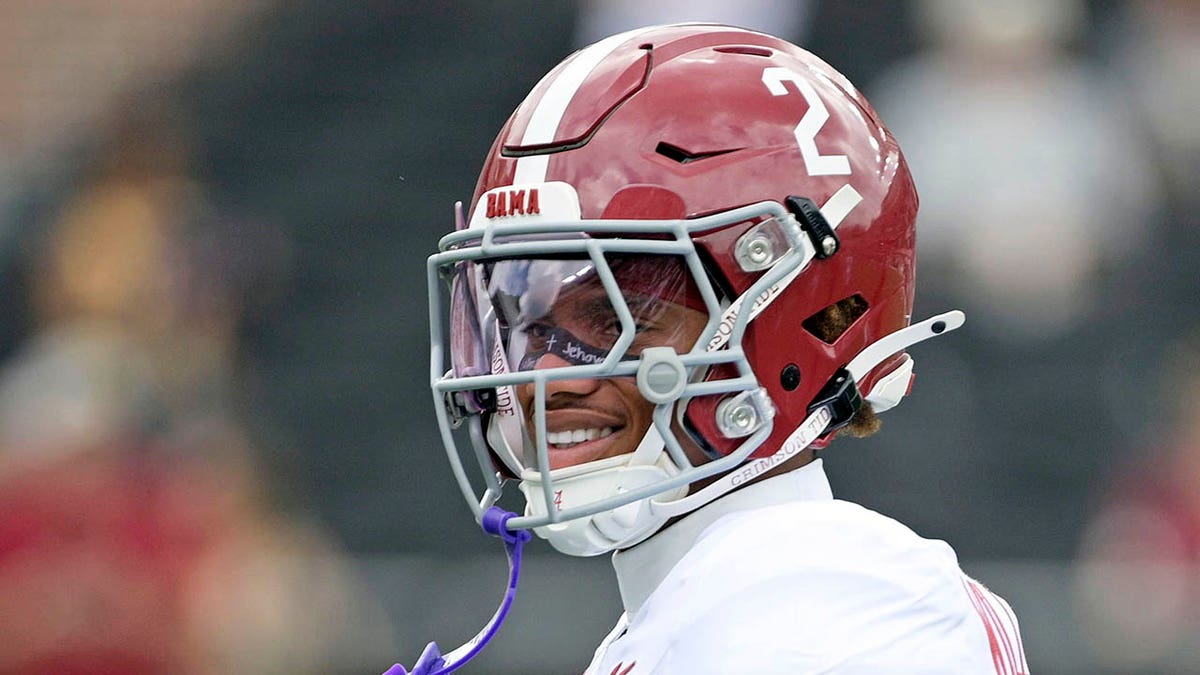 Alabama Crimson Tide wide receiver Ryan Williams warming up on the field.