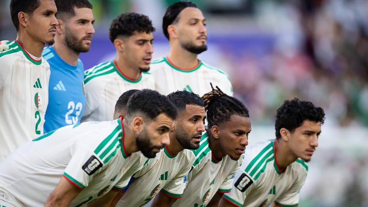 Riyad Mahrez and Algeria starting eleven posing on field before FIFA World Cup 2026 match in Santa Clara