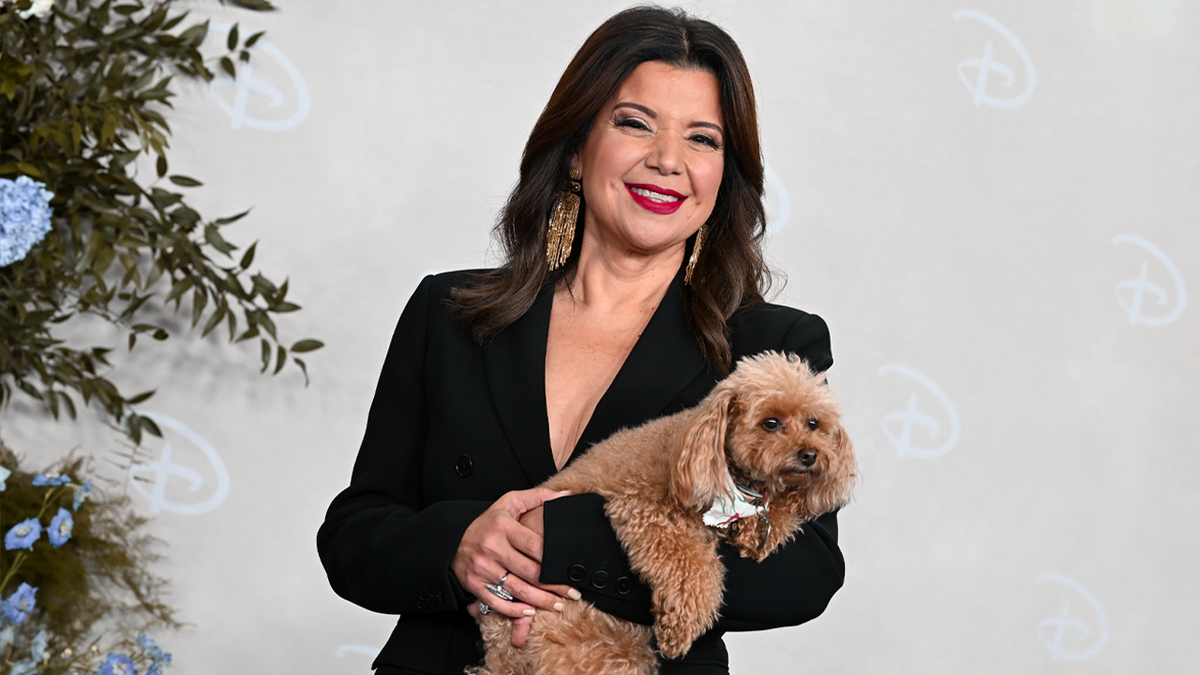 Ana Navarro smiles with her dog