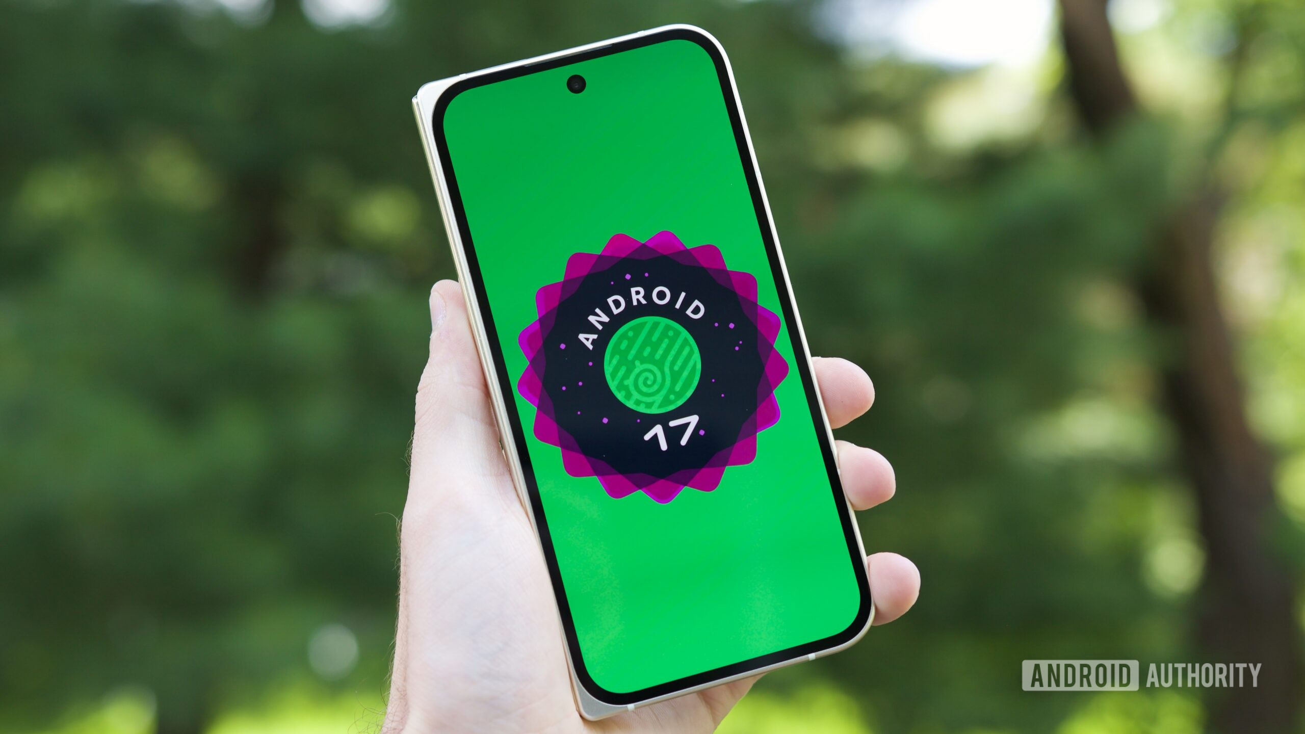 android 17 logo green background outside 2 Android 17 logo on a Pixel phone.
