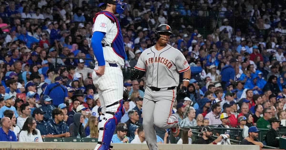 Chapman's 10th-inning single gives the Giants a 2-1 win over the Cubs