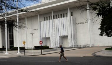 Kennedy Center exterior remains covered after Trump’s name is removed