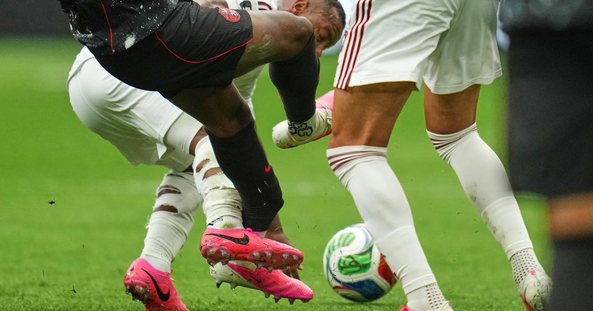Qatar's Assim Madibo receives 5-game World Cup ban after breaking the leg of Canada's Ismaël Koné in group match