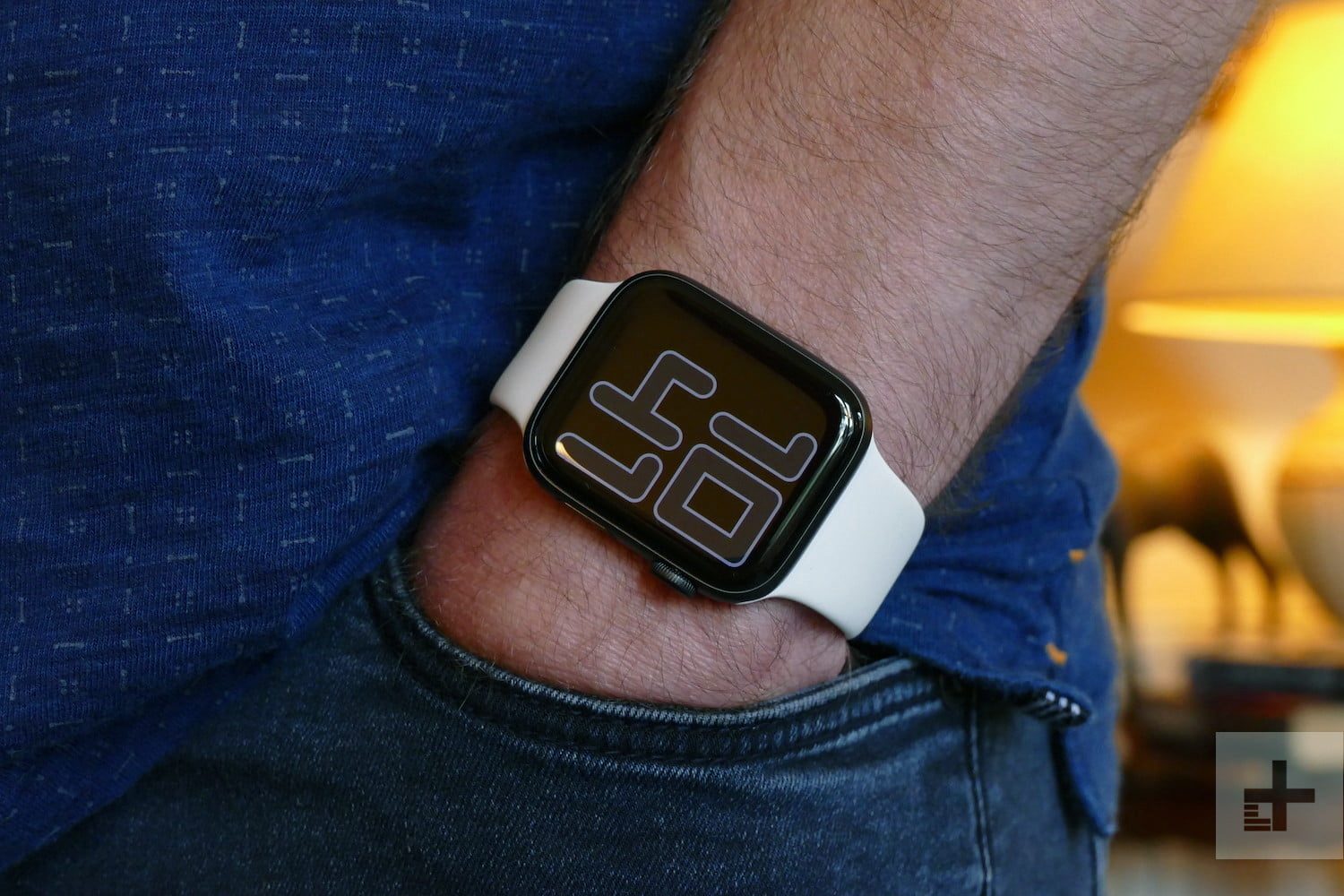 Someone wearing an Apple Watch Series 5 on their wrist.