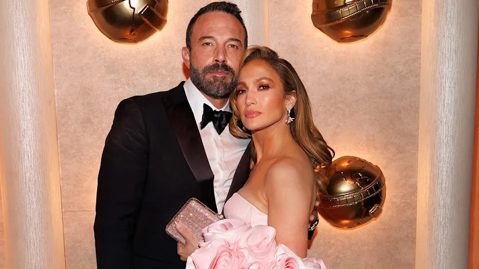 Jennifer Lopez and Ben Affleck standing together at the Golden Globe Awards.