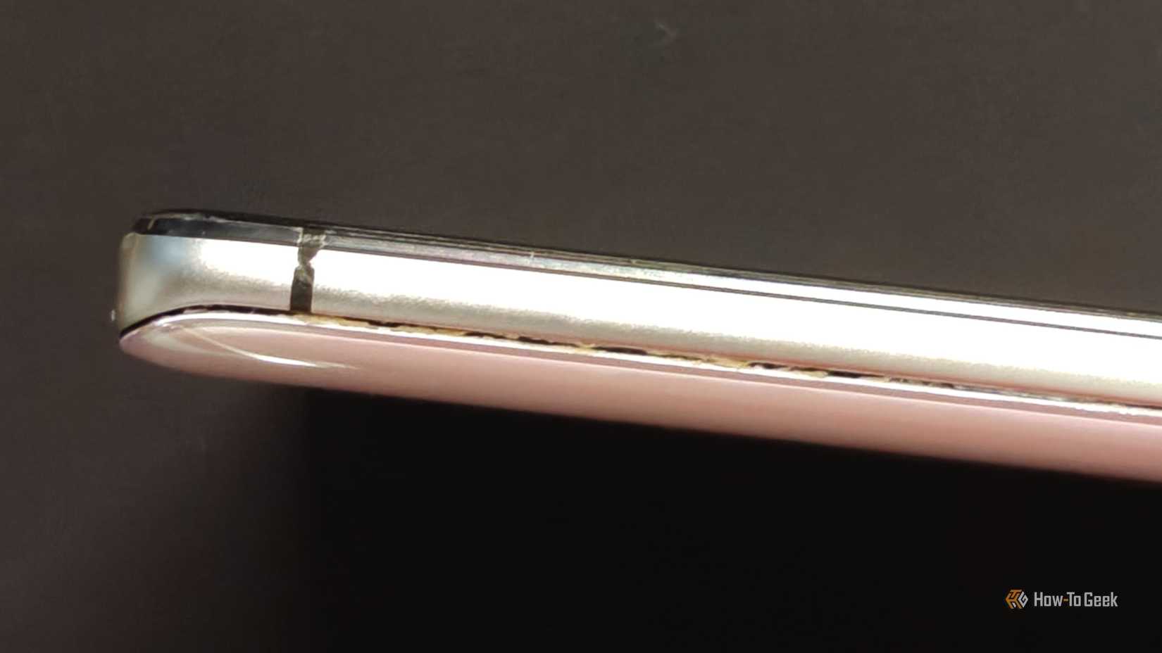 Battery swollen in a phone so much that it caused the glass back to pop off.