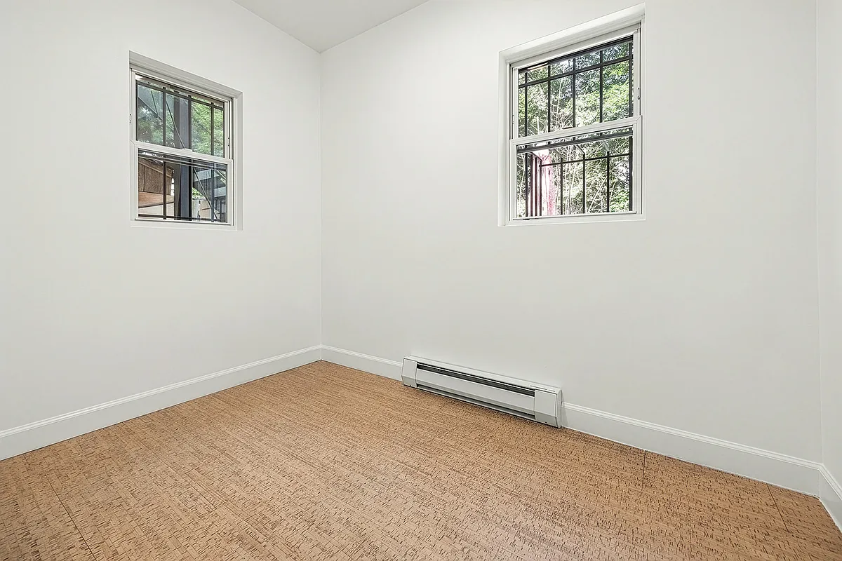 bedroom with two exposures, white walls