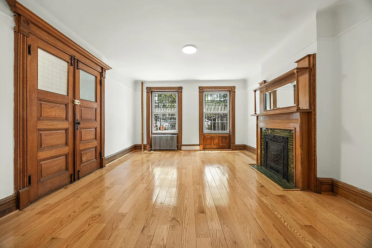 garden level room with wood mantel