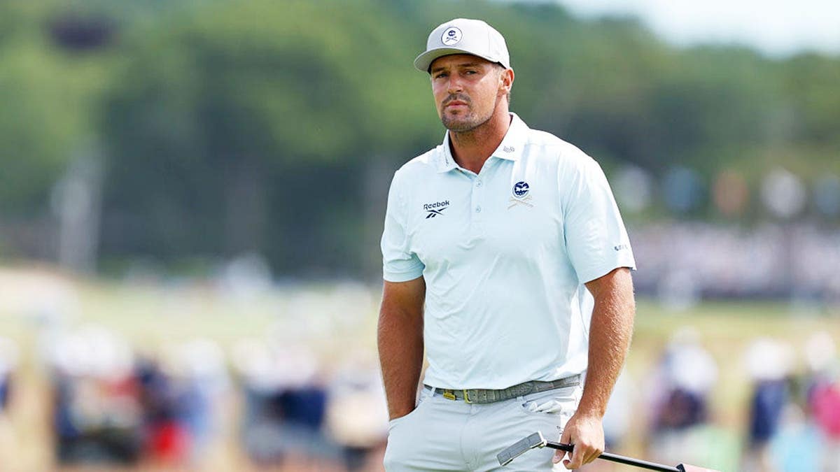 Bryson DeChambeau looking on from the eighth green at Shinnecock Hills Golf Club.