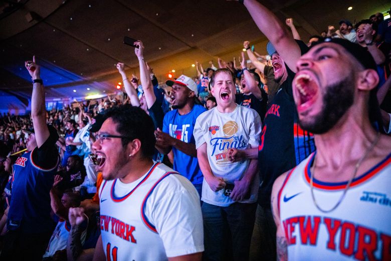 New York Knicks fans cheer during the watch party at Madison Square Garden for Game 2 of the NBA Finals against the San Antonio Spurs on June 5, in New York City.