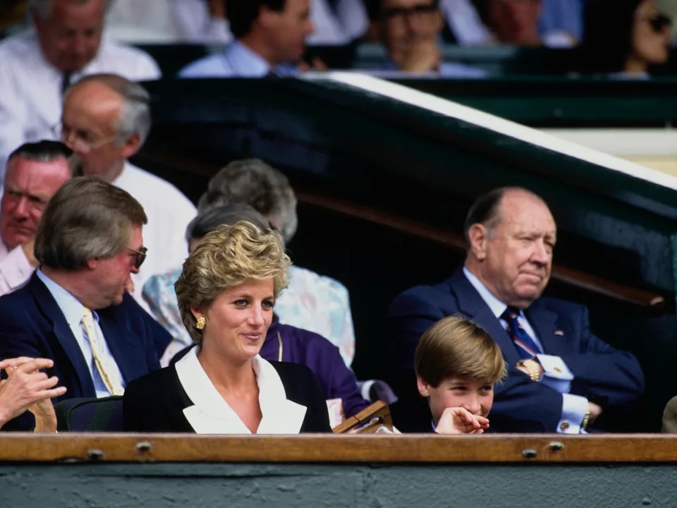 Princess Diana and Prince William, among other seated spectators.