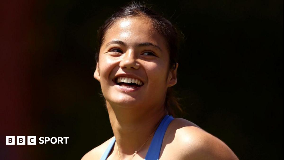 Emma Raducanu smiles after completing her opening victory at Queen's