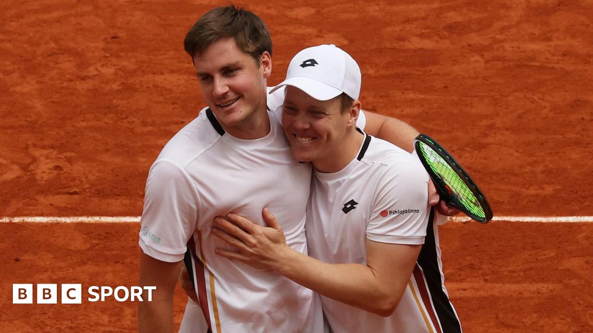 Harri Heliovaara of Finland and Henry Patten of Great Britain celebrate winning match point against Quentin Halys and Pierre-Hugues Herbert of France