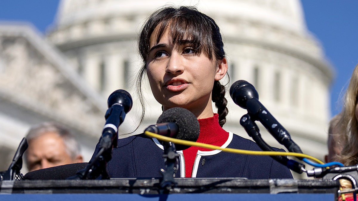 Chloe Cole speaking during a news conference on Capitol Hill in Washington, D.C.