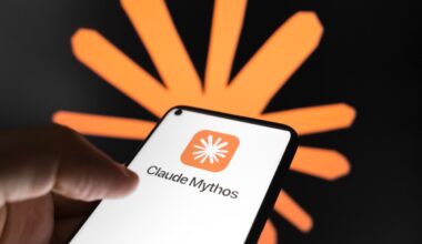 The Claude Mythos logo appears on a smartphone screen, and the Claude AI logo displays as the background on a laptop computer screen.