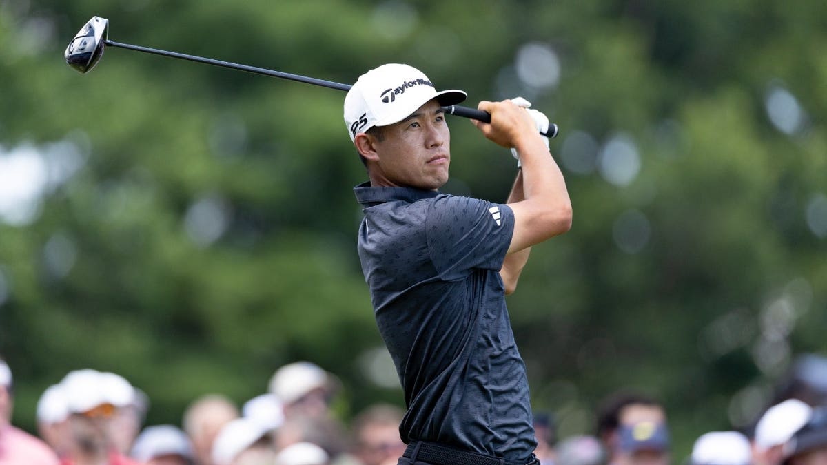 Collin Morikawa drives his ball off the first tee during the 2025 Travelers Championship in Cromwell, Connecticut.