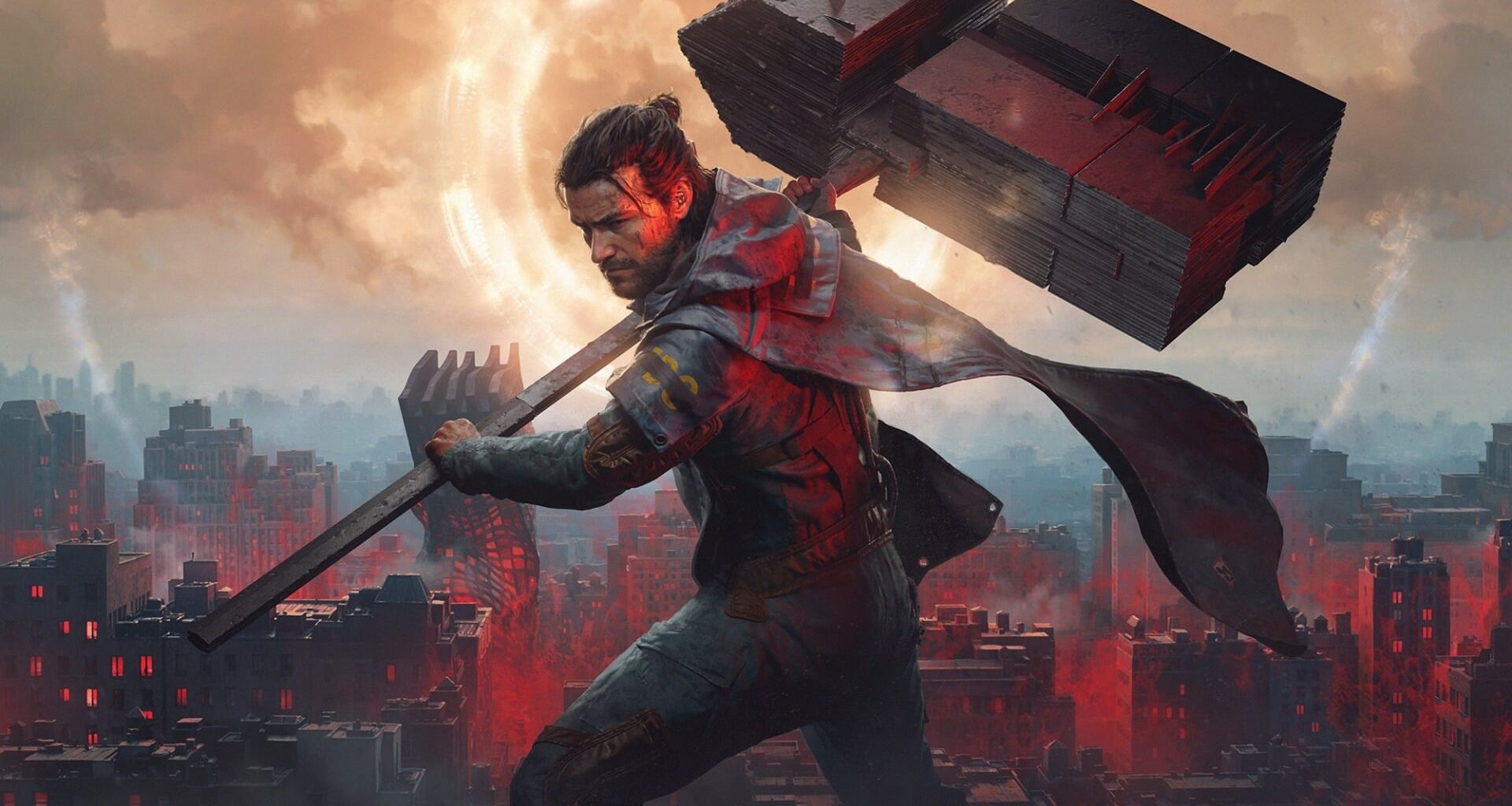 A man holds up a giant hammer.