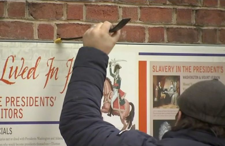 One wall at the President’s House in Philadelphia shows one panel up, while others are removed by crowbar.