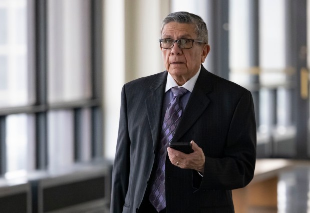 Dr. Fabio Ortega walks outside the courtroom during a break in a trial at the Daley Center on March 22, 2023. (Brian Cassella/Chicago Tribune)