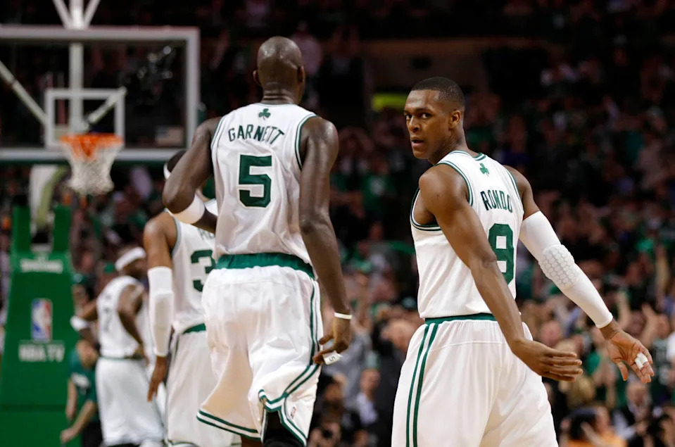 May 7, 2011; Boston, MA, USA; Boston Celtics power forward Kevin Garnett (5) talks with point guard Rajon Rondo (9) in game three of the second round of the 2011 NBA playoffs against the Miami Heat at TD Garden. Mandatory Credit: David Butler II-USA TODAY Sports