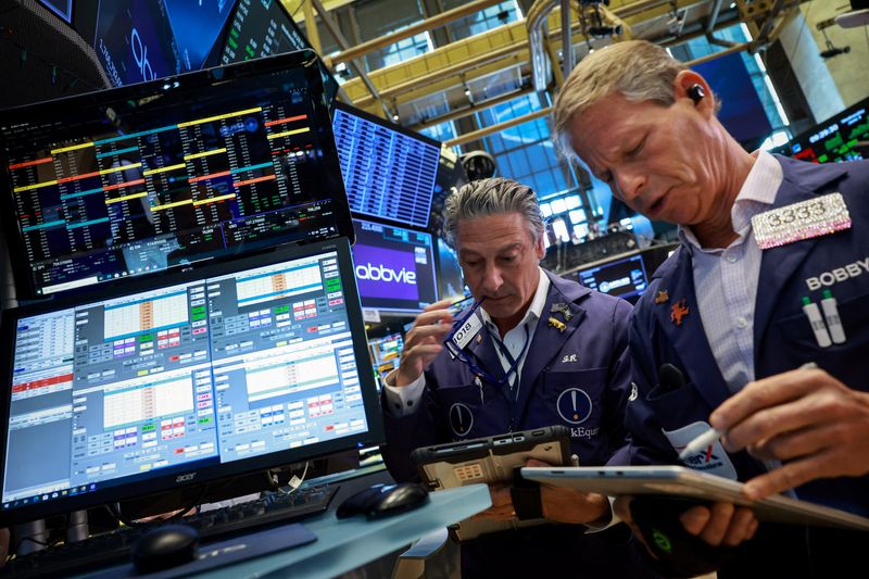 Wall Street slumps as chips slide, robust jobs data stokes fears of hawkish Fed