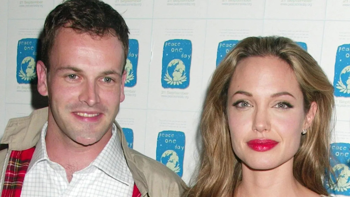 Angelina Jolie's first husband Jonny Lee Miller, 53, looks completely different in rare photo with son