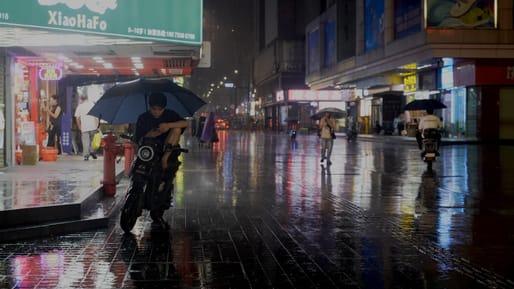 Adam James Smith, “A neon-lit street scene in Shenzhen at night during a rainstorm,” 2025. Digital photograph. Courtesy Adam James Smith. From the 2026 grant to Adam James Smith for the film “Nighthawk”