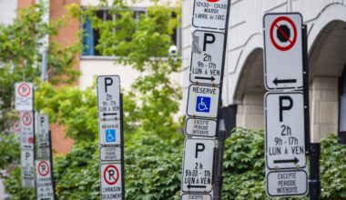Numerous parking restriction signs are confusing.