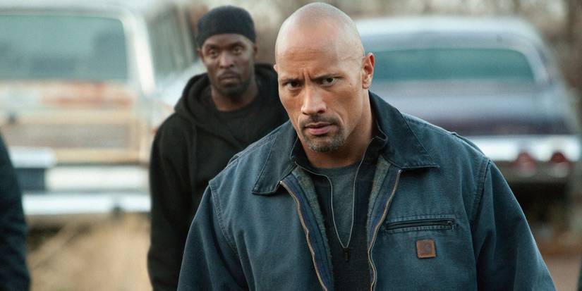 Dwayne The Rock Johnson and Michael Kenneth Williams in Snitch.
