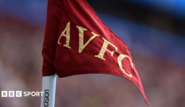 A corner flag with the Aston Villa initials displayed on it