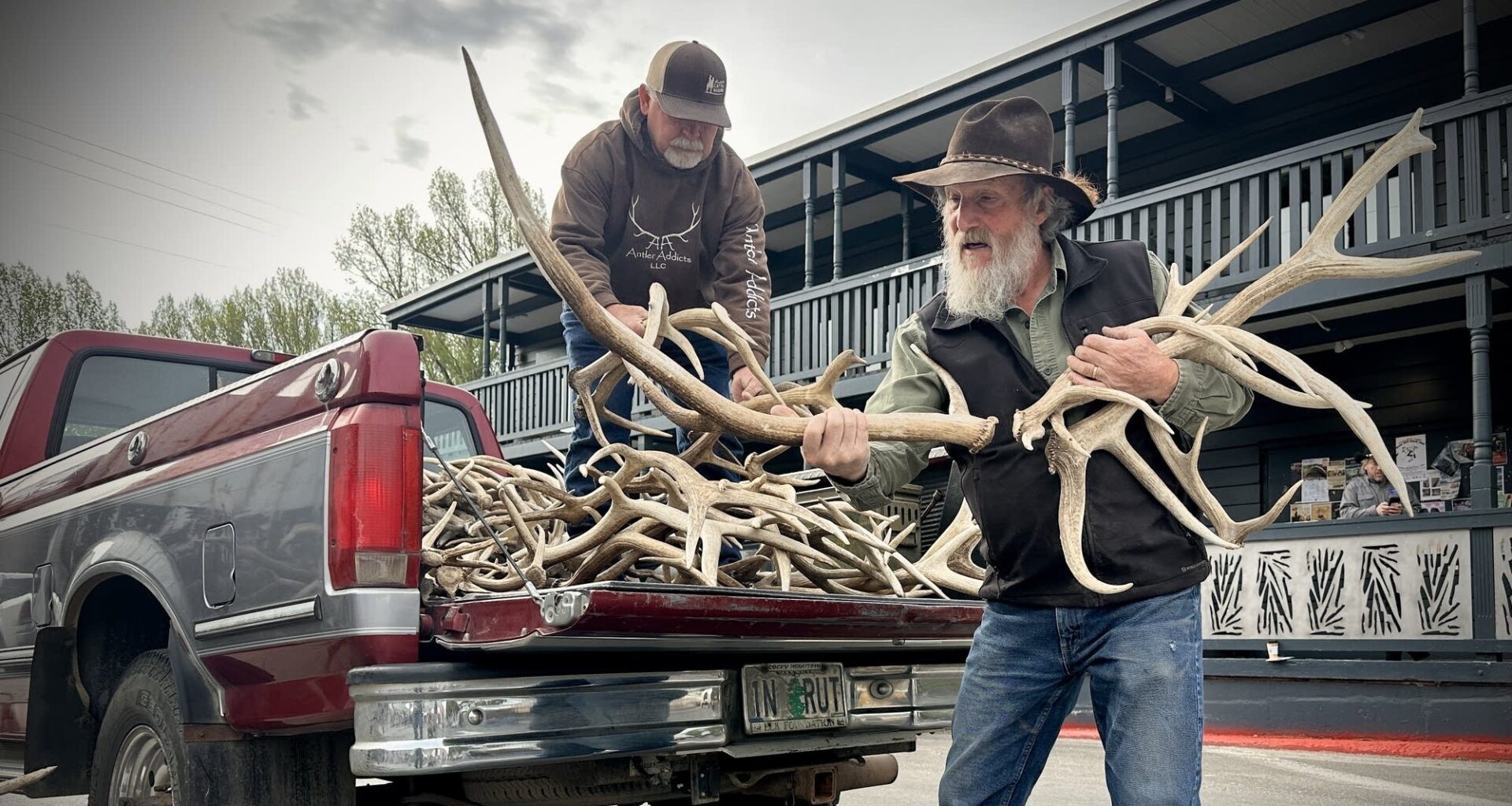 Mike Bosworth (left) unloads the antlers he is selling to Roy Rasmussen, who will then re-sell the antlers throughout the year.