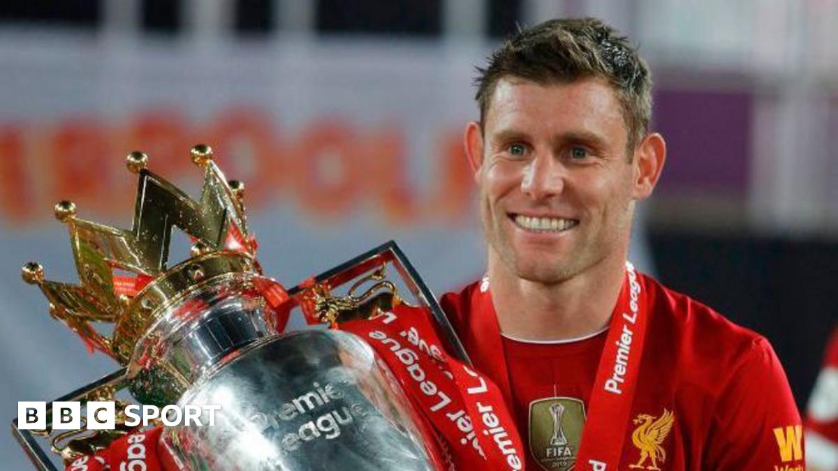 James Milner with the Premier League trophy after Liverpool's title win in 2020