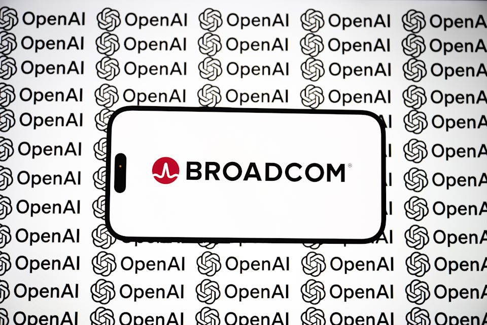 ANKARA, TURKIYE - OCTOBER 22: In this photo illustration the Broadcom logo is displayed on a mobile phone screen in front of the OpenAI logos in Ankara, Turkiye on October 22, 2025. (Photo by Ismail Aslandag/Anadolu via Getty Images)
